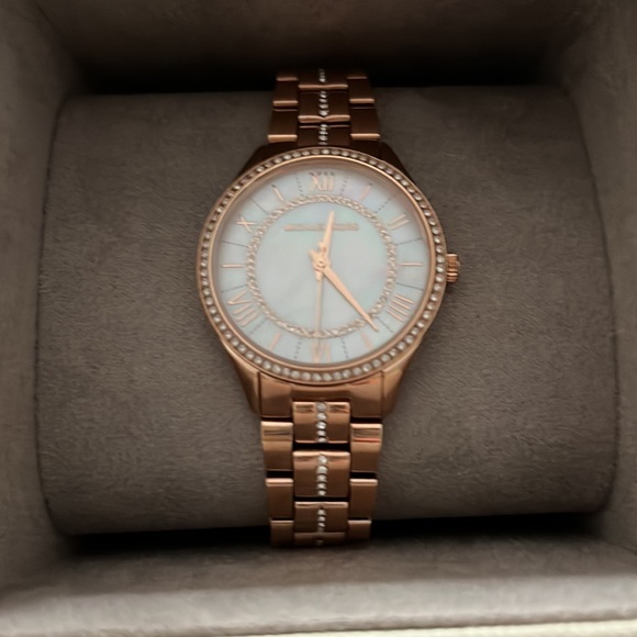 Brand new Michael Kors watch. Has never been worn, and is in perfect condition.